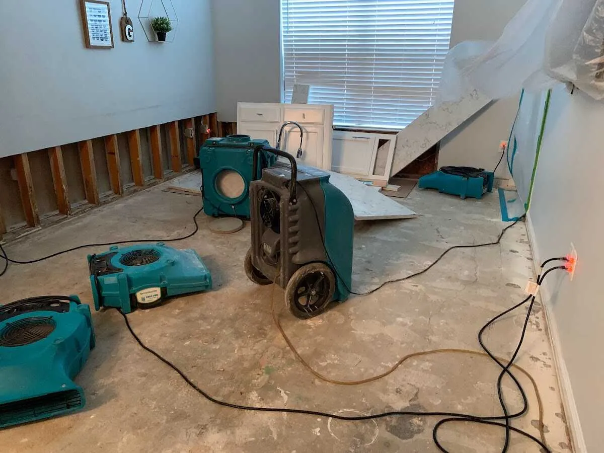 Dehumidifier in flood-cut room for Water Damage Restoration in Northport